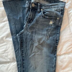 Distressed Rock  Blue Jeans